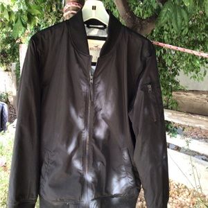 Black jacket, small but fits medium, unisex, excellent condition